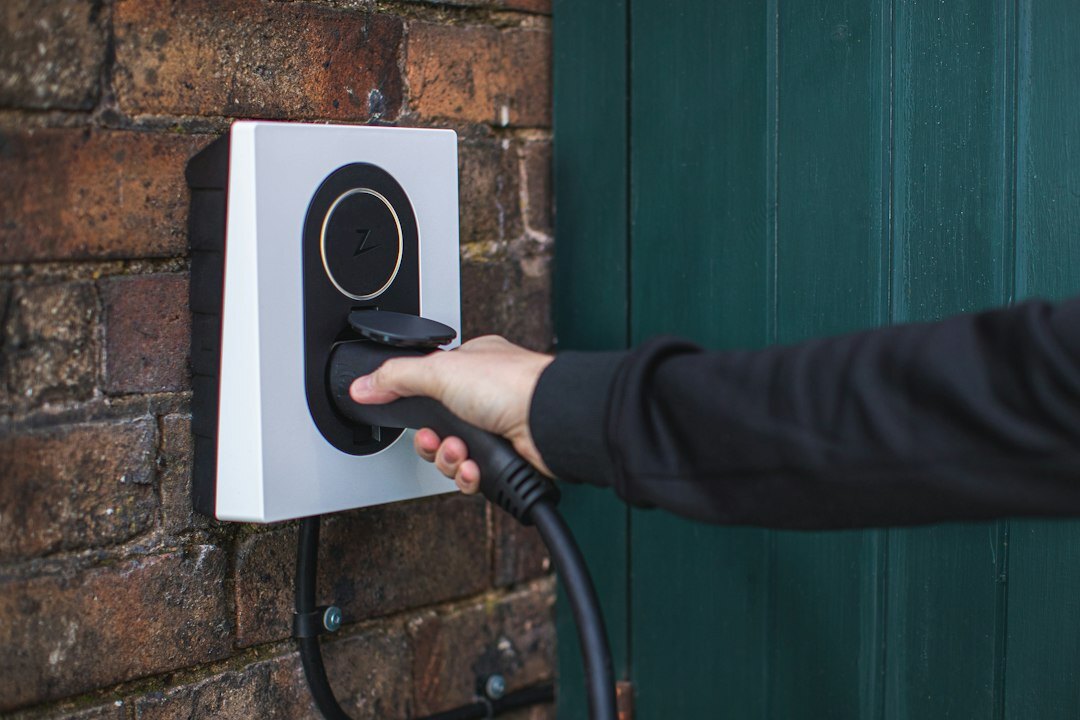 Electric car charging at a modern charging station