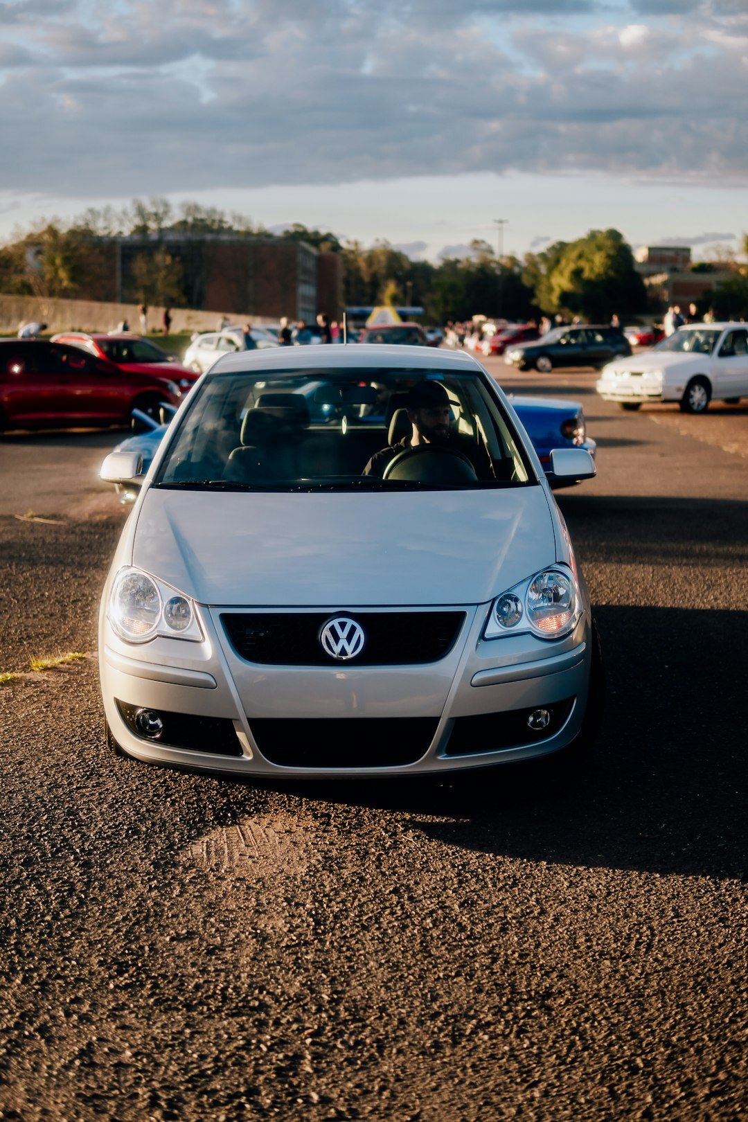 Clean used car parked for a sale listing photo shoot