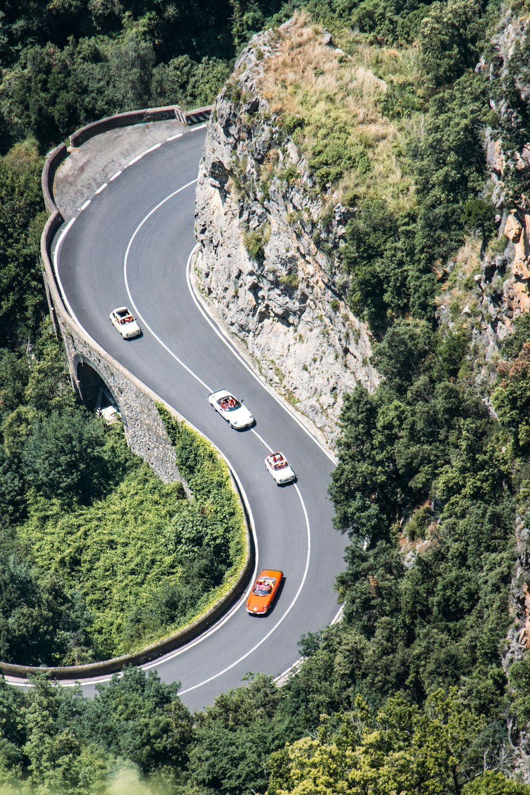 coastal road with convertible car
