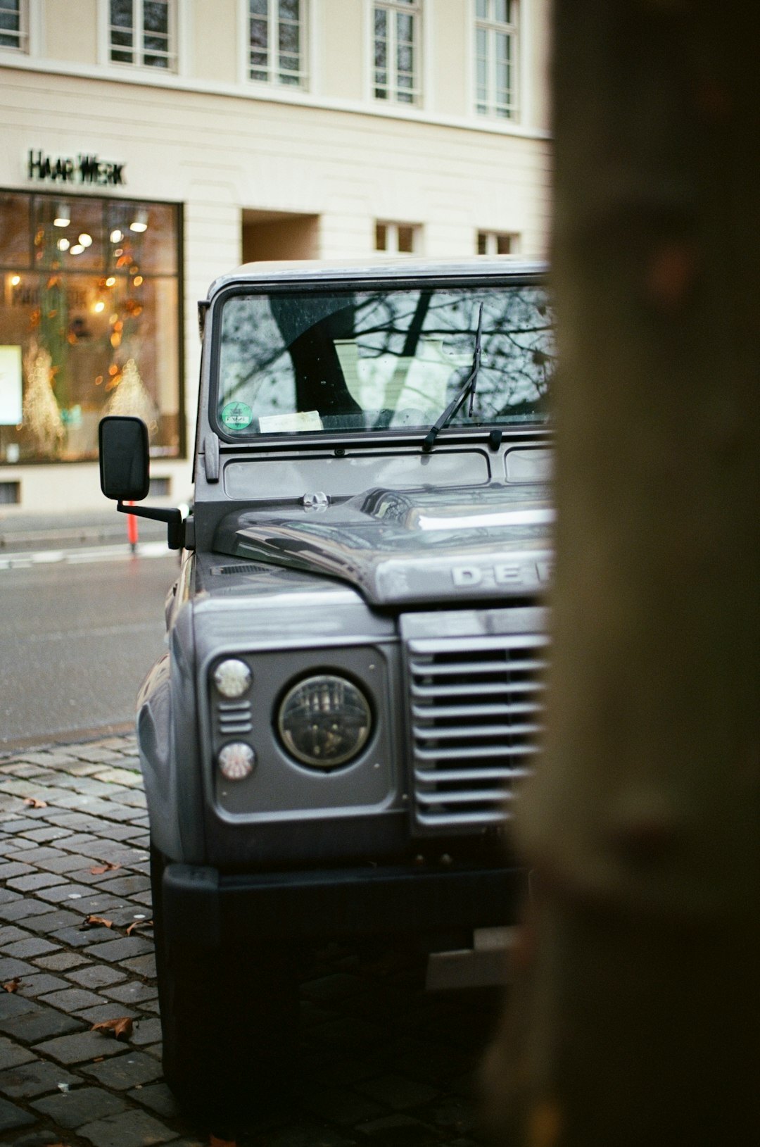 Modern silver SUV parked in an urban setting