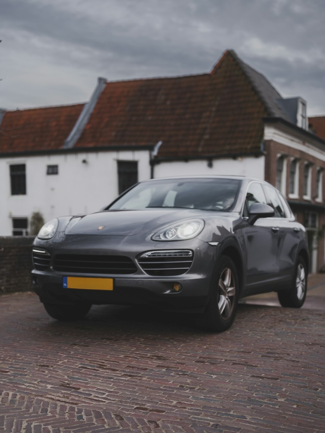 Front three quarter view of a premium grey SUV